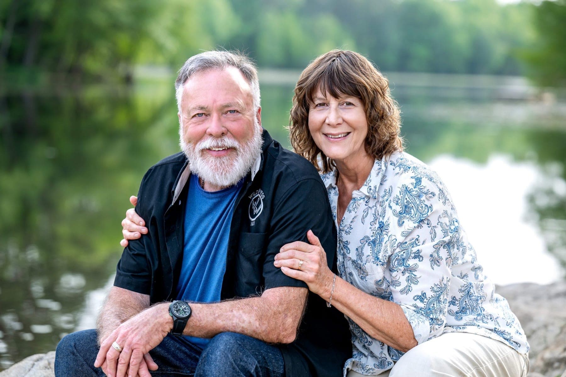 Paul and Vicki Taylor seated together outdoors