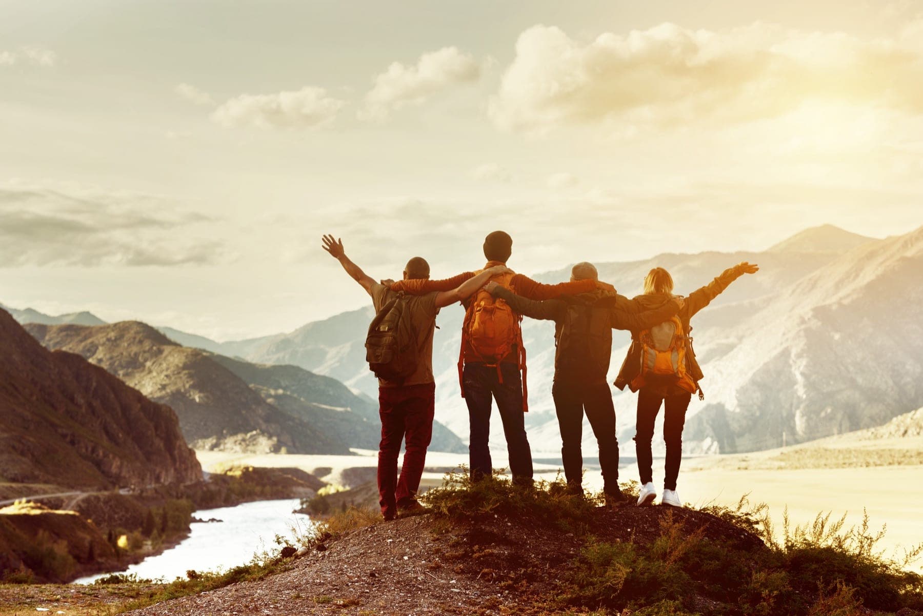 A group overlooking a mountain valley together
